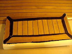 auf Backskistendeckel kleben und verfugen mit Sikaflex